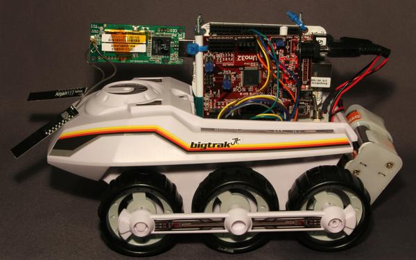 View of the modified BigTrak robot with BeagleBone and ChipKit mounted on the back.