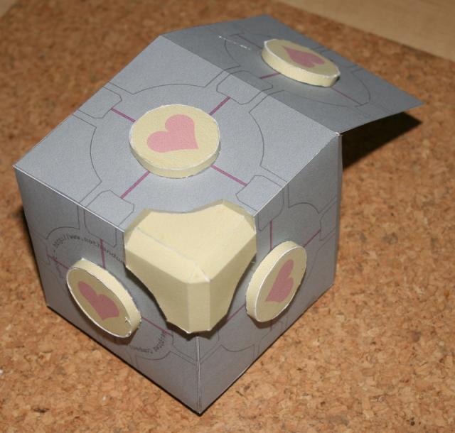 Weighted Companion Cube, fitting the first of the corner pieces to the cube.