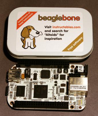 A photo of the BeagleBone next to the Altoids tin it came with.